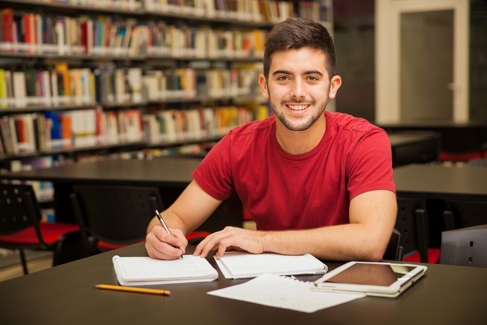 charming-brunette-studying-alone_23-2147656011