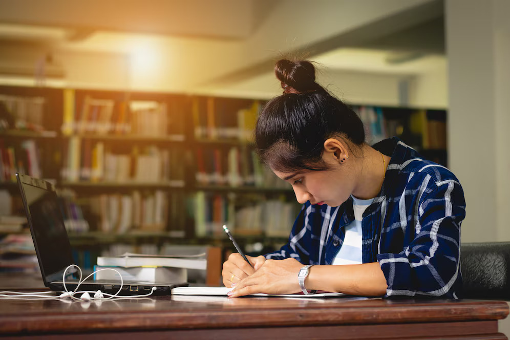 closeup-woman-student-reading-book_35934-227