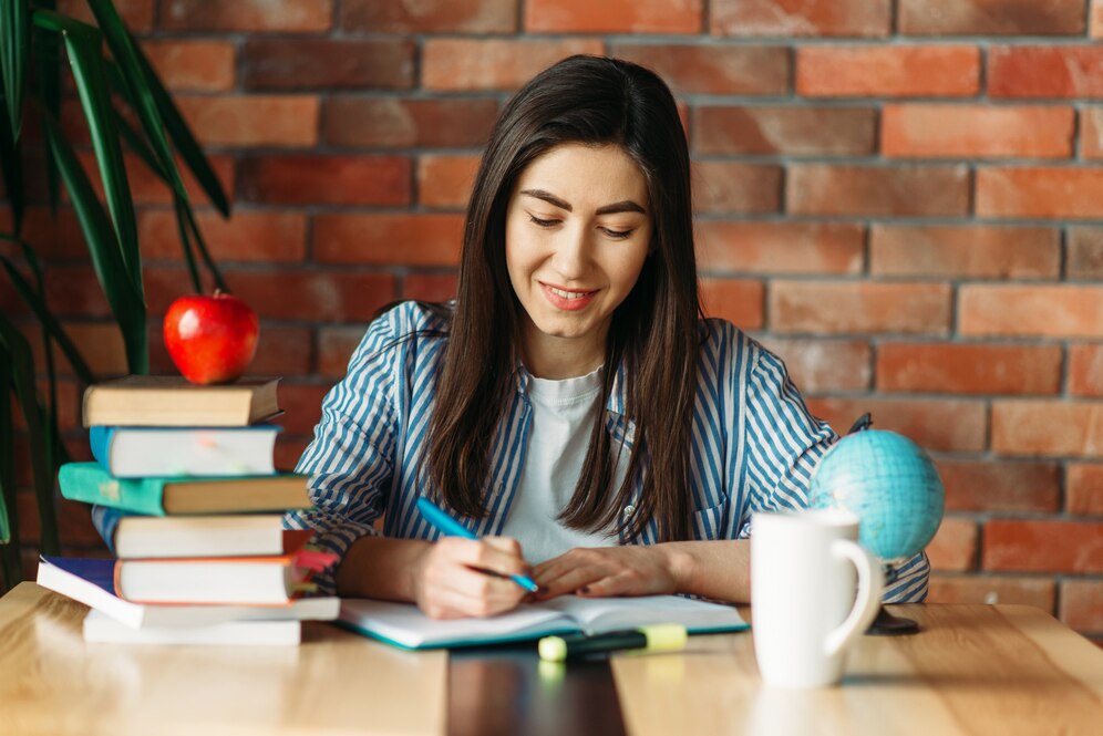female-student-sitting-table-with-textbooks_266732-9579